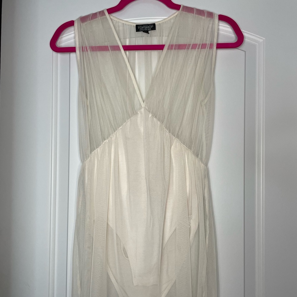 White bodysuit from Topshop. Size small. Great condition.